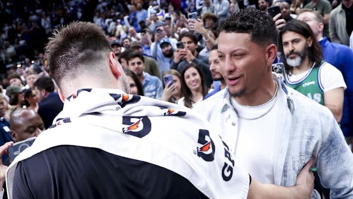 Apr 9, 2025; Dallas, Texas, USA;  Los Angeles Lakers guard Luka Doncic (77) hugs Kansas City Chiefs quarterback Patrick Mahomes after the game against the Dallas Mavericks at American Airlines Center. Mandatory Credit: Kevin Jairaj-Imagn Images