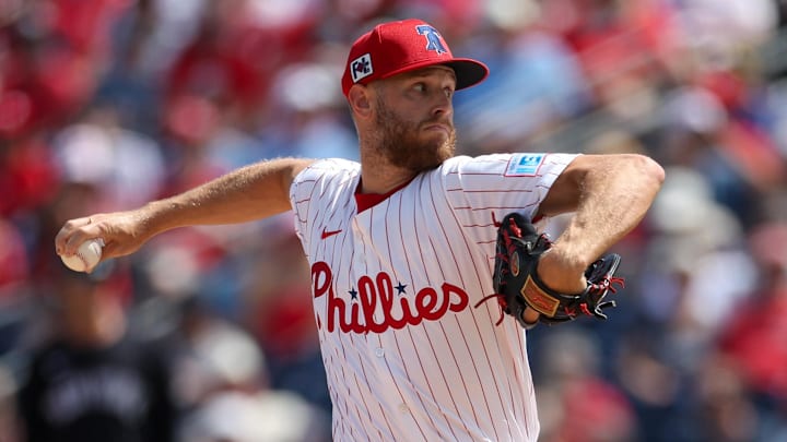Mar 4, 2025; Clearwater, Florida, USA; Philadelphia Phillies pitcher Zack Wheeler (45) throws a pitch against the New York Yankees in the first inning during spring training at BayCare Ballpark.