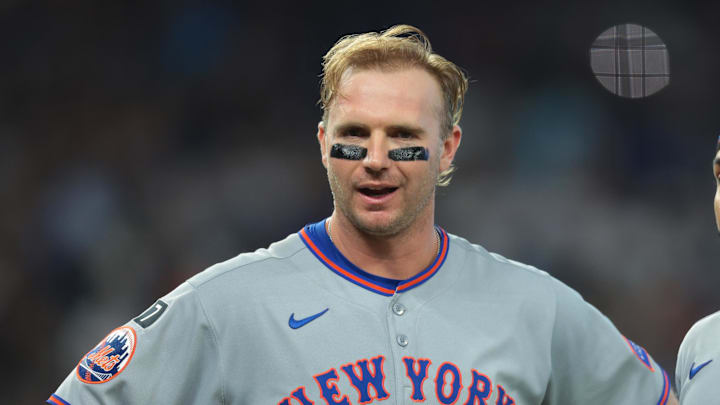 Sep 28, 2025; Miami, Florida, USA; New York Mets first baseman Pete Alonso (20) reacts while standing next to shortstop Francisco Lindor (12) after his at bat against the Miami Marlins during the fifth inning at loanDepot Park. Mandatory Credit: Sam Navarro-Imagn Images