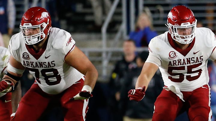 Good offensive line play has long been a tradition for the Arkansas Razorbacks, exemplified last year by Joshua Braun (78) and Beaux Limmer (55). Braun was a mainstay on the 2024 offensive line for the Hogs while Limmer is the starting center for the Los Angeles Rams in his rookie season.