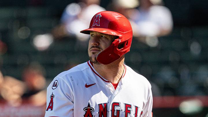 Aug 26, 2026; Anaheim, California, USA;  Los Angeles Angels center fielder Mike Trout (27) returns to the dugout after striking out in the eighth inning against the Cleveland Guardians at Angel Stadium.  Mandatory Credit: Jon Endow-Imagn Images