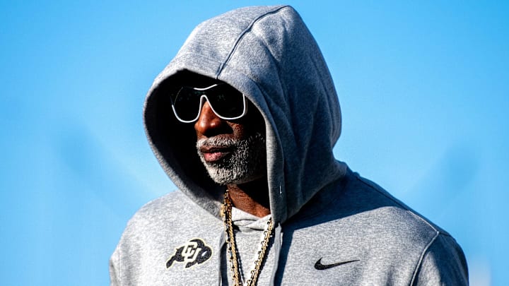 CU football head coach Deion Sanders, or Coach Prime, watches his team warm up before the game against CSU in the Rocky Mountain Showdown at Canvas Stadium on Saturday, Sept. 14, 2024, in Fort Collins, Colo.   