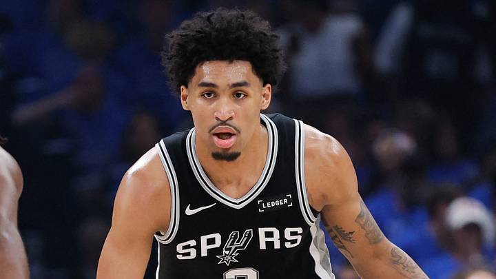 May 18, 2026; Oklahoma City, Oklahoma, USA; San Antonio Spurs guard Dylan Harper (2) drives the ball while defended by Oklahoma City Thunder guard Cason Wallace (22) in the first quarter during game one of the western conference finals for the 2026 NBA playoffs at Paycom Center. Mandatory Credit: Alonzo Adams-Imagn Images