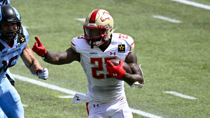 Mar 30, 2024; Arlington, TX, USA; Birmingham Stallions running back Ricky Person (23) runs for a touchdown past Arlington Renegades linebacker Storey Jackson (16) during the second half at Choctaw Stadium. Mandatory Credit: Jerome Miron-USA TODAY Sports