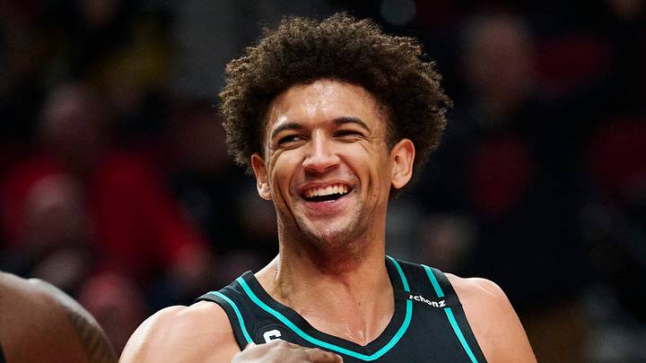 Feb 13, 2023; Portland, Oregon, USA;  Portland Trail Blazers forward Matisse Thybulle (4) smiles during the first half with forward Nassir Little (10) after blocking a shot against the Los Angeles Lakers at Moda Center. Mandatory Credit: Troy Wayrynen-USA TODAY Sports