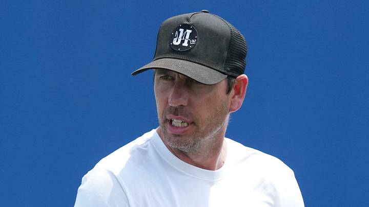 Indianapolis Colts head coach Shane Steichen speaks withwide receiver Deion Burks