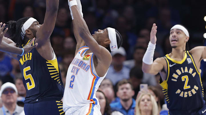 Mar 29, 2025; Oklahoma City, Oklahoma, USA; Oklahoma City Thunder guard Shai Gilgeous-Alexander (2) shoots as Indiana Pacers forward Jarace Walker (5) defends during the second half at Paycom Center. Mandatory Credit: Alonzo Adams-Imagn Images