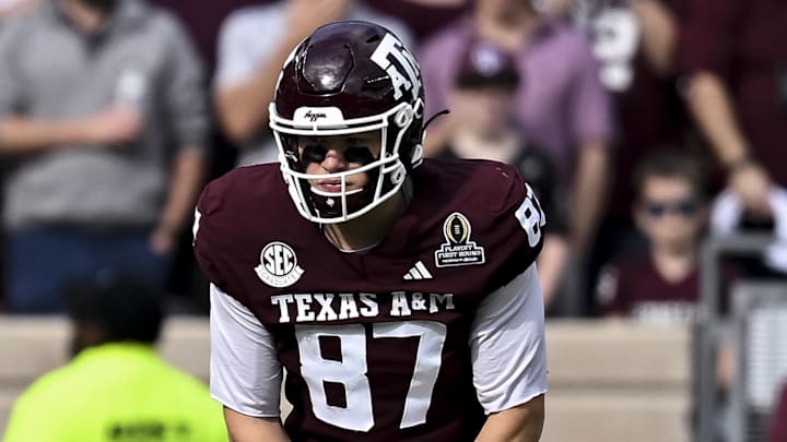 Dec 20, 2025; College Station, TX, USA; Texas A&M Aggies tight end Nate Boerkircher (87) and wide receiver KC Concepcion (7) line up during the first half against the Miami Hurricanes at Kyle Field. Mandatory Credit: Maria Lysaker-Imagn Images