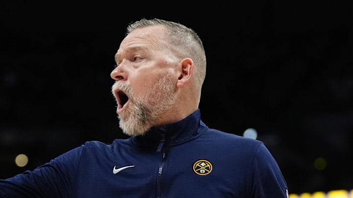 Apr 6, 2025; Denver, Colorado, USA; Denver Nuggets head coach Michael Malone reacts in the second half against the Indiana Pacers at Ball Arena. Mandatory Credit: Ron Chenoy-Imagn Images