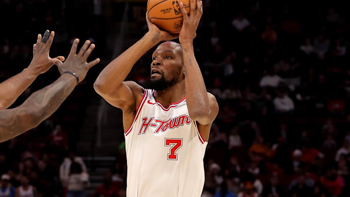 Jan 18, 2026; Houston, Texas, USA; Houston Rockets forward Kevin Durant (7) shoots against New Orleans Pelicans forward Zion Williamson (1) during the first quarter at Toyota Center. Mandatory Credit: Erik Williams-Imagn Images