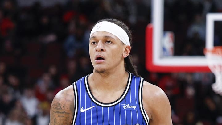 Orlando Magic forward Paolo Banchero looks to pass the ball against the Chicago Bulls. Orlando Magic forward Paolo Banchero looks to pass the ball against the Chicago Bulls.