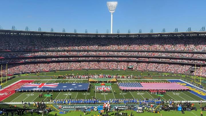 Sep 11, 2026; Melbourne, Victoria, Australia; A general overall view of Australia and United States flags on the field during the playing of the national anthem at the 2026 NFL Melbourne Game at Melbourne Cricket Ground. Mandatory Credit: Kirby Lee-Imagn Images Sep 11, 2026; Melbourne, Victoria, Australia; A general overall view of Australia and United States flags on the field during the playing of the national anthem at the 2026 NFL Melbourne Game at Melbourne Cricket Ground. Mandatory Credit: Kirby Lee-Imagn Images