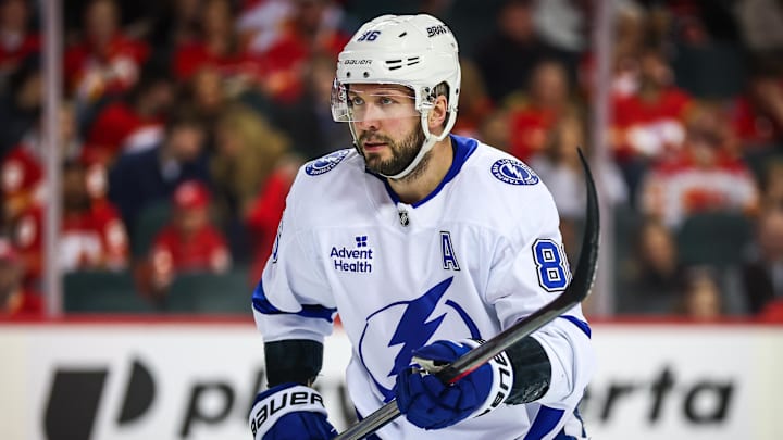 Mar 22, 2026; Calgary, Alberta, CAN; Tampa Bay Lightning right wing Nikita Kucherov (86) during the face off against the Calgary Flames during the first period at Scotiabank Saddledome. Mandatory Credit: Sergei Belski-Imagn Images