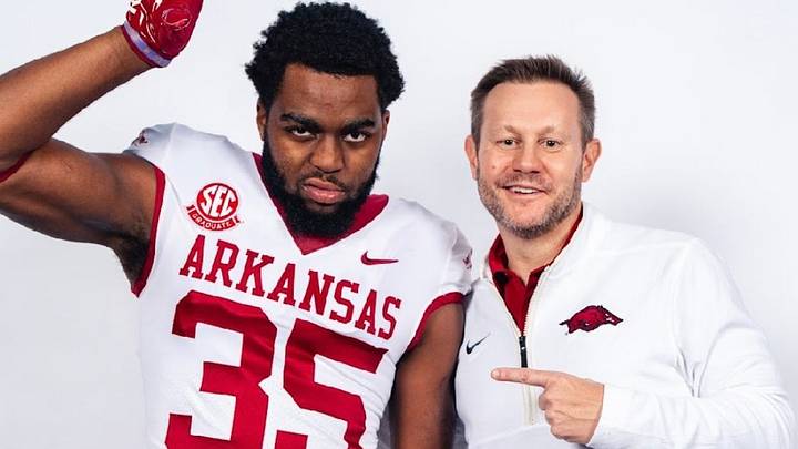 Arkansas Razorbacks EDGE rusher Steven Soles Jr. (left) with coach Ryan Silverfield during his visit to Fayetteville. Arkansas Razorbacks EDGE rusher Steven Soles Jr. (left) with coach Ryan Silverfield during his visit to Fayetteville.