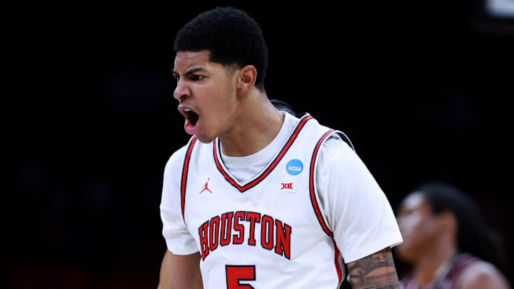 Houston's Chris Cenac Jr. cheers during a second-round game in the NCAA men's basketball tournament