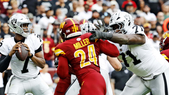 Sep 21, 2025; Landover, Maryland, USA; Las Vegas Raiders quarterback Geno Smith (7) drops back to pass during the second half against the Washington Commanders at Northwest Stadium. Mandatory Credit: Geoff Burke-Imagn Images Sep 21, 2025; Landover, Maryland, USA; Las Vegas Raiders quarterback Geno Smith (7) drops back to pass during the second half against the Washington Commanders at Northwest Stadium. Mandatory Credit: Geoff Burke-Imagn Images