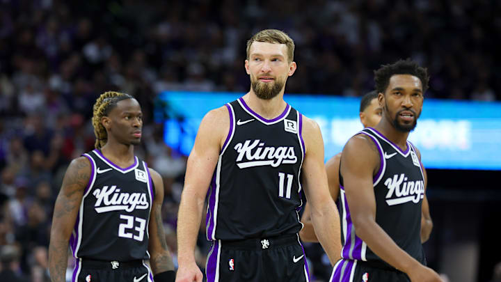 Oct 24, 2024; Sacramento, California, USA; Sacramento Kings forward Domantas Sabonis (11) and guard Malik Monk (0) walk up the court against the Minnesota Timberwolves during the fourth quarter at Golden 1 Center.