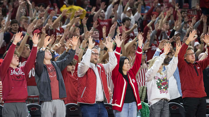 Arkansas Razorbacks fans call the Hogs in the second half of the Hogs' 75-60 victory against the Texas-San Antonio Roadrunners at Bud Walton Arena on Dec. 7. Hogs coach John Calipari hopes Arkansas' faithful fans show up in force today against No. 8 Florida. Arkansas Razorbacks fans call the Hogs in the second half of the Hogs' 75-60 victory against the Texas-San Antonio Roadrunners at Bud Walton Arena on Dec. 7. Hogs coach John Calipari hopes Arkansas' faithful fans show up in force today against No. 8 Florida.