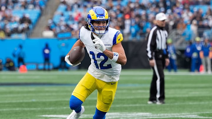 Nov 30, 2025; Charlotte, North Carolina, USA; Los Angeles Rams wide receiver Puka Nacua (12) runs after making a catch during the first quarter against the Carolina Panthers at Bank of America Stadium. Mandatory Credit: Jim Dedmon-Imagn Images