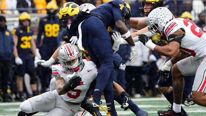 MLive's Ryan Zuke believes "The Game" between Michigan and Ohio State is no longer fit for rivalry week in a 24-team CFP