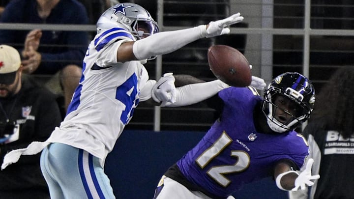 Aug 16, 2025; Arlington, Texas, USA; Dallas Cowboys cornerback Zion Childress (48) breaks up a pass intended for Baltimore Ravens wide receiver Malik Cunningham (12) during the second half at AT&T Stadium. Mandatory Credit: Jerome Miron-Imagn Images