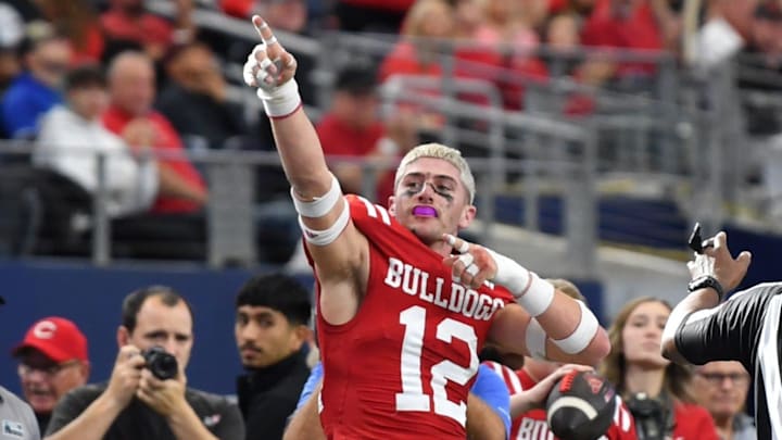 Carthage's Carson Crawford signals first down during the 4A DII UIL Texas State Football Championship game Waco La Vega on Friday, December 20, 2024 at AT&T Stadium in Arlington.