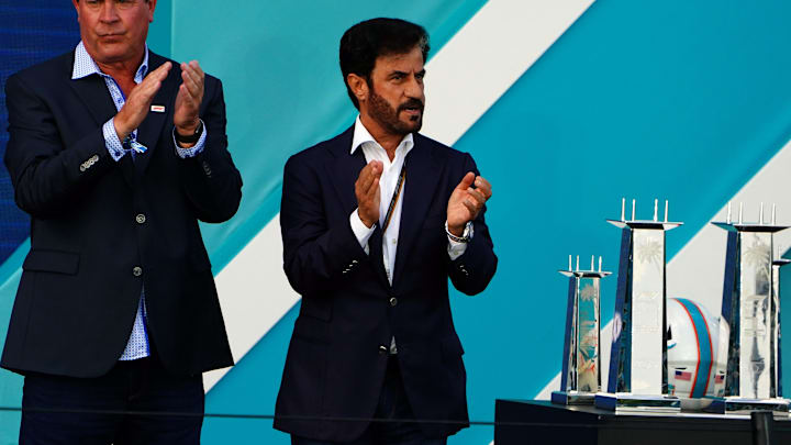 May 8, 2022; Miami Gardens, Florida, USA; Dan Marino and FIA president Mohammed Ben Sulayem applaud during the award ceremony following the Miami Grand Prix at Miami International Autodrome. Mandatory Credit: John David Mercer-Imagn Images May 8, 2022; Miami Gardens, Florida, USA; Dan Marino and FIA president Mohammed Ben Sulayem applaud during the award ceremony following the Miami Grand Prix at Miami International Autodrome. Mandatory Credit: John David Mercer-Imagn Images