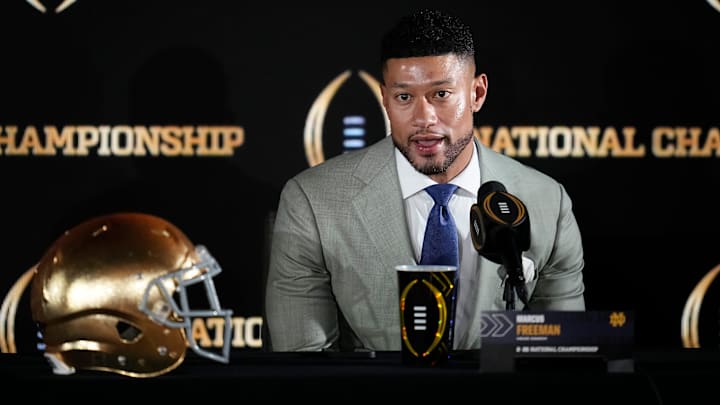 Notre Dame Fighting Irish head coach Marcus Freeman speaks during a press conference with Ohio State Buckeyes head coach Ryan Day prior to their College Football Playoff championship matchup in Atlanta on Jan. 19, 2025.
