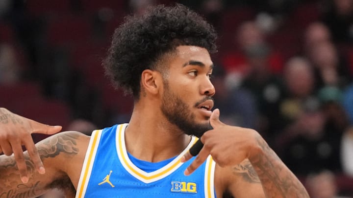 Mar 13, 2026; Chicago, IL, USA; UCLA Bruins guard Donovan Dent (2) gestures a after making a three point basket against the Michigan State Spartans during the first half at United Center. Mandatory Credit: David Banks-Imagn Images