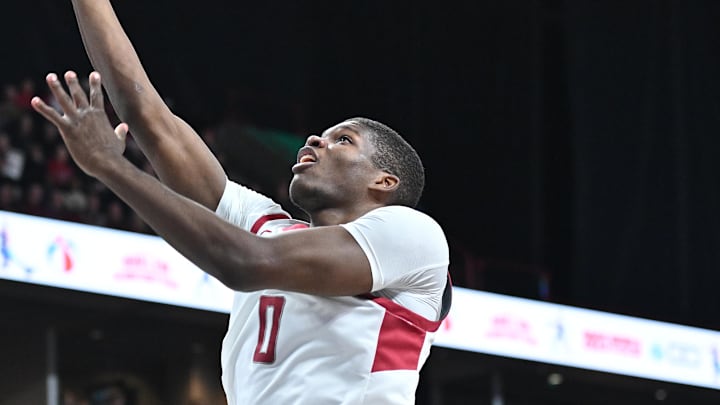 Nov 21, 2024; Spokane, Washington, USA; Washington State Cougars guard Cedric Coward (0) makes an easy lay up against the Eastern Washington Eagles in the first half at Spokane Veterans Memorial Arena. Mandatory Credit: James Snook-Imagn Images