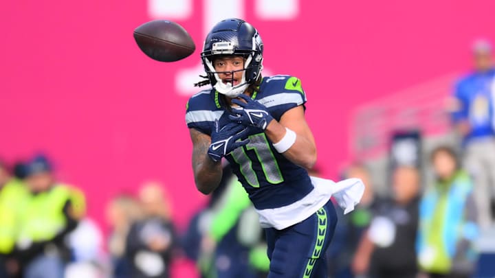 Nov 3, 2024; Seattle, Washington, USA; Seattle Seahawks wide receiver Jaxon Smith-Njigba (11) tips a pass resulting in a Los Angeles Rams interception in the first half at Lumen Field. Mandatory Credit: Steven Bisig-Imagn Images