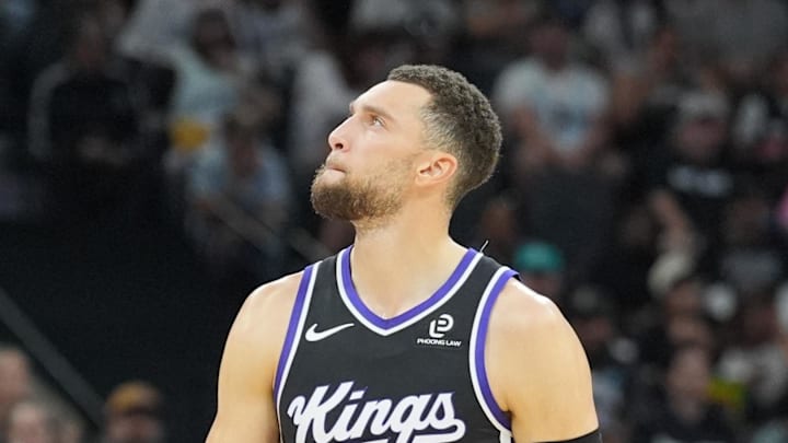 Nov 16, 2025; San Antonio, Texas, USA; Sacramento Kings guard Zach LaVine (8) walks up the court in the first half against the San Antonio Spurs at Frost Bank Center. Nov 16, 2025; San Antonio, Texas, USA; Sacramento Kings guard Zach LaVine (8) walks up the court in the first half against the San Antonio Spurs at Frost Bank Center.