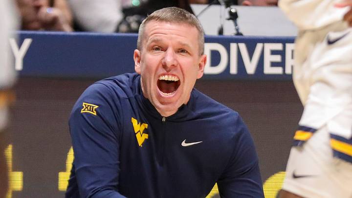 Feb 28, 2026; Morgantown, West Virginia, USA; West Virginia Mountaineers head coach Ross Hodge yells from the sideline during the second half against the BYU Cougars at Hope Coliseum. Mandatory Credit: Ben Queen-Imagn Images