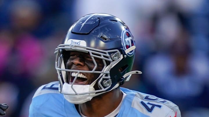 Tennessee Titans linebacker Jihad Ward and linebacker Arden Key celebrate the sack.