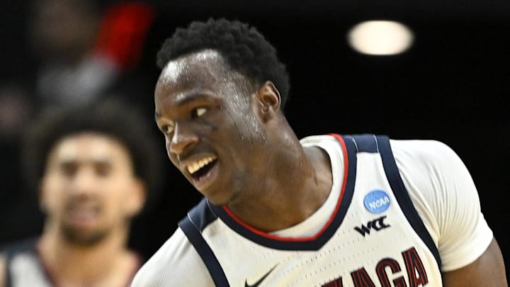 Mar 21, 2026; Portland, OR, USA; Gonzaga Bulldogs forward Emmanuel Innocenti (5) reacts after a play in the first half against the Texas Longhorns during a second round game of the men's 2026 NCAA Tournament at Moda Center. Mandatory Credit: Craig Strobeck-Imagn Images Mar 21, 2026; Portland, OR, USA; Gonzaga Bulldogs forward Emmanuel Innocenti (5) reacts after a play in the first half against the Texas Longhorns during a second round game of the men's 2026 NCAA Tournament at Moda Center. Mandatory Credit: Craig Strobeck-Imagn Images