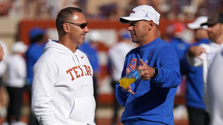 Texas Longhorns Head Coach Steve Sarkisian talks with Florida Gators Head Coach Jon Sumrall before a game at Darrell K Royal-Texas Memorial Stadium. Texas Longhorns Head Coach Steve Sarkisian talks with Florida Gators Head Coach Jon Sumrall before a game at Darrell K Royal-Texas Memorial Stadium.