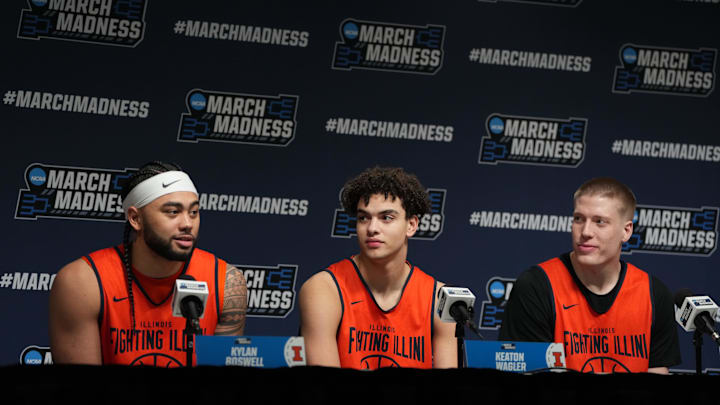 Mar 18, 2026; Greenville, SC, USA; Illinois Fighting Illini guard Kylan Boswell (4) and guard Keaton Wagler (23) and forward Ben Humrichous (3) during a press conference ahead of the first round of the men's 2026 NCAA Tournament at Bon Secours Wellness Arena. Mandatory Credit: Bob Donnan-Imagn Images