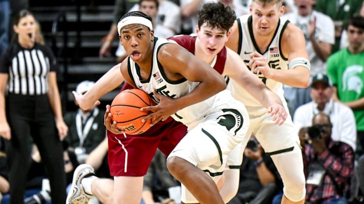 Michigan State's Jeremy Fears Jr. steals the ball from Colgate during the second half on Monday, Nov. 3, 2025, at the Breslin Center in East Lansing.
