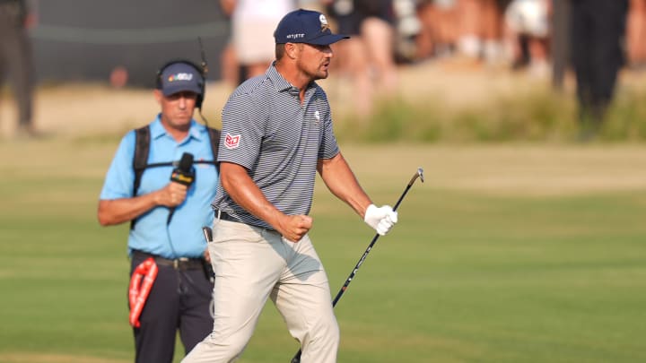 DeChambeau was pumped after executing his bunker shot on 18, but he still had a 4-footer to make.