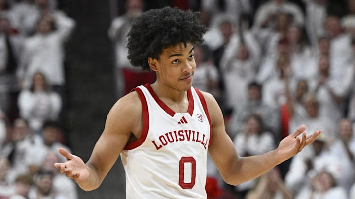 Feb 9, 2026; Louisville, Kentucky, USA;  Louisville Cardinals guard Mikel Brown Jr. (0) reacts during the second half against the NC State Wolfpack at KFC Yum! Center. Louisville defeated N.C. State 118-77. Mandatory Credit: Jamie Rhodes-Imagn Images