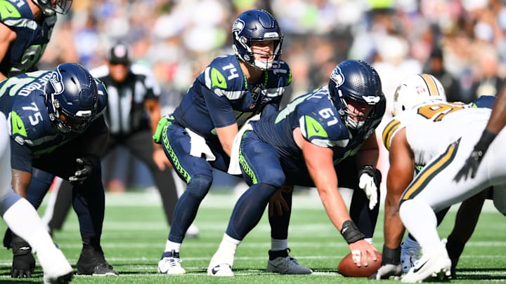 Sep 21, 2025; Seattle, Washington, USA; Seattle Seahawks quarterback Sam Darnold (14) waits for the snap during the third quarter against the New Orleans Saints at Lumen Field. Sep 21, 2025; Seattle, Washington, USA; Seattle Seahawks quarterback Sam Darnold (14) waits for the snap during the third quarter against the New Orleans Saints at Lumen Field.