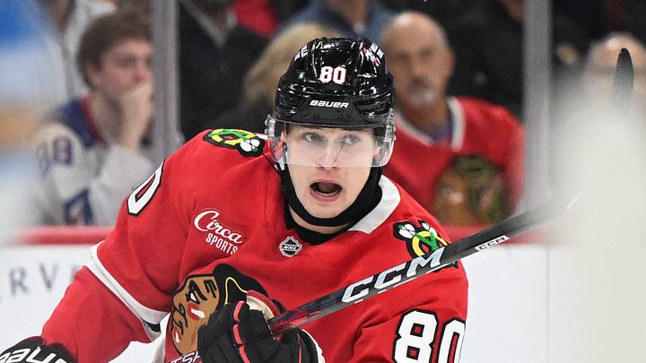 Oct 6, 2026; Chicago, Illinois, USA;  Chicago Blackhawks right wing Roman Kantserov (80) chases the puck against the St. Louis Blues during the first period at United Center.  Mandatory Credit: Matt Marton-Imagn Images
