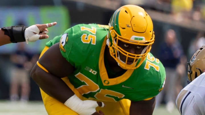 Oregon offensive linemen Iapani Laloulu, left, and Emmanuel Pregnon line up as the Oregon Ducks host the Montana State Bobcats on Aug. 30, 2025, at Autzen Stadium in Eugene, Oregon. Oregon offensive linemen Iapani Laloulu, left, and Emmanuel Pregnon line up as the Oregon Ducks host the Montana State Bobcats on Aug. 30, 2025, at Autzen Stadium in Eugene, Oregon.