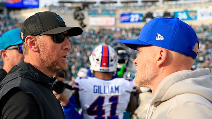 Jacksonville Jaguars head coach Liam Coen, left, greets Buffalo Bills head coach Sean McDermott after the game of an NFL football AFC Wild Card playoff matchup, Sunday, Jan. 11, 2026, in Jacksonville, Fla. The Bills defeated the Jaguars 27-24. [Corey Perrine/Florida Times-Union]