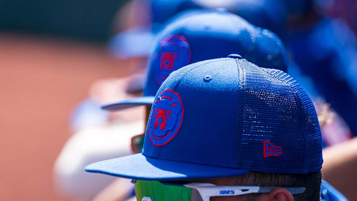 Mar 18, 2023; Scottsdale, Arizona, USA;  A general view hats belonging to Chicago Cubs players in the dugout during the first inning during a spring training game against the San Fracisco Giants at Scottsdale Stadium. 