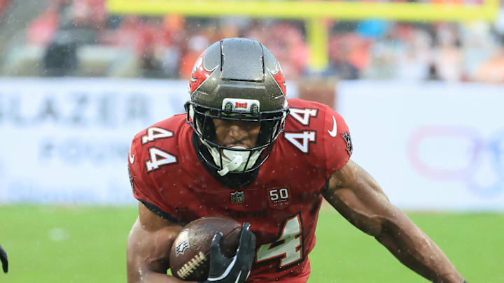 Tampa Bay Buccaneers running back Sean Tucker (44) runs for a gain past New Orleans Saints cornerback Kool-Aid McKinstry Tampa Bay Buccaneers running back Sean Tucker (44) runs for a gain past New Orleans Saints cornerback Kool-Aid McKinstry