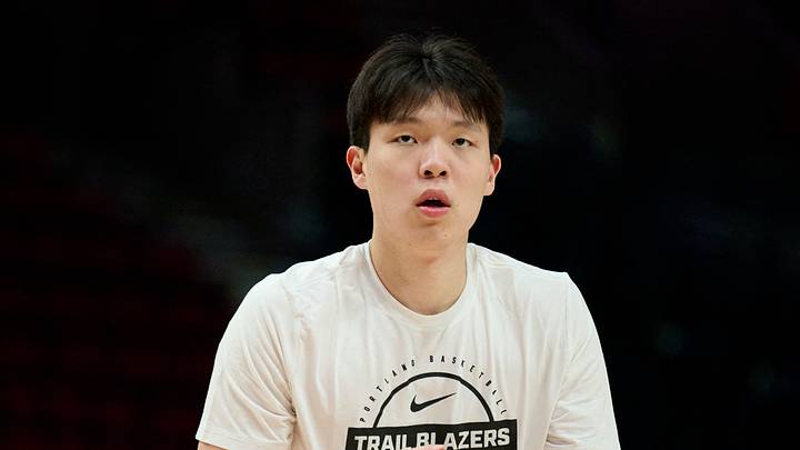Jan 17, 2026; Portland, Oregon, USA; Portland Trail Blazers center Yang Hansen (16) warms up before a game against the Los Angeles Lakers at Moda Center. Mandatory Credit: Troy Wayrynen-Imagn Images