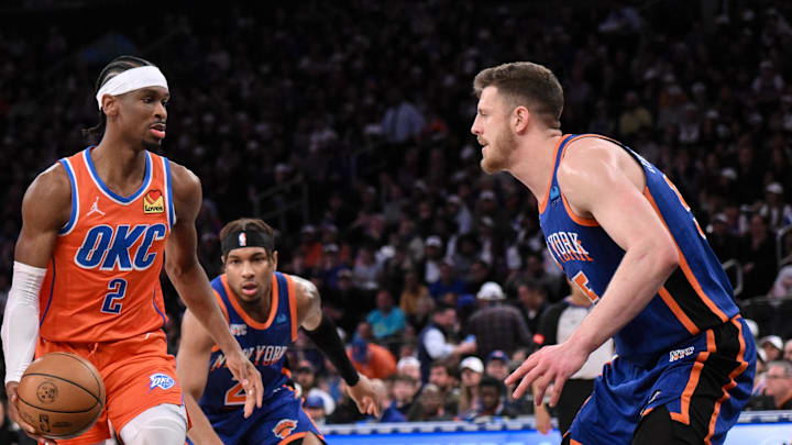 Mar 31, 2024; New York, New York, USA; Oklahoma City Thunder guard Shai Gilgeous-Alexander (2) looks to get past New York Knicks center Isaiah Hartenstein (55)  at Madison Square Garden. Mandatory Credit: John Jones-Imagn Images
