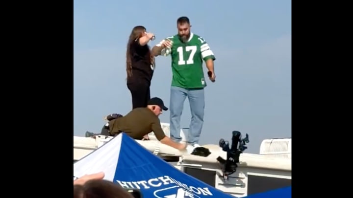 Jason Kelce reacts to a camera guy falling down.