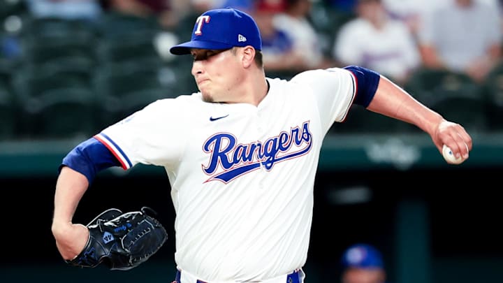 May 27, 2025; Arlington, Texas, USA; Texas Rangers relief pitcher Robert Garcia (62) throws during the ninth inning against the Toronto Blue Jays at Globe Life Field.